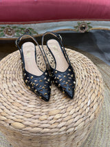 Ovye- Slingback con borchie