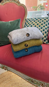 Cardigan con bottoni e taschine variante colore  